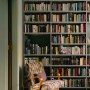 Victorian Terrace, Waterloo | bespoke metal bookcase houses the clients book collection | Interior Designers